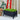 Sort plantekasse på ben med grønne planter, 88 × 37 × 39 cm